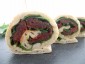 Rolle Ruccola getrocknete Tomate