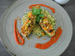 Vegetarisch oder vegan gefüllte Zucchini auf Kräutercouscous