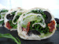 Rolle Frischkäse, Zucchini grilliert, getrocknete Tomate, Oliven & Rucola